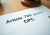 Zoom sur des documents légaux avec Article 700 CPC